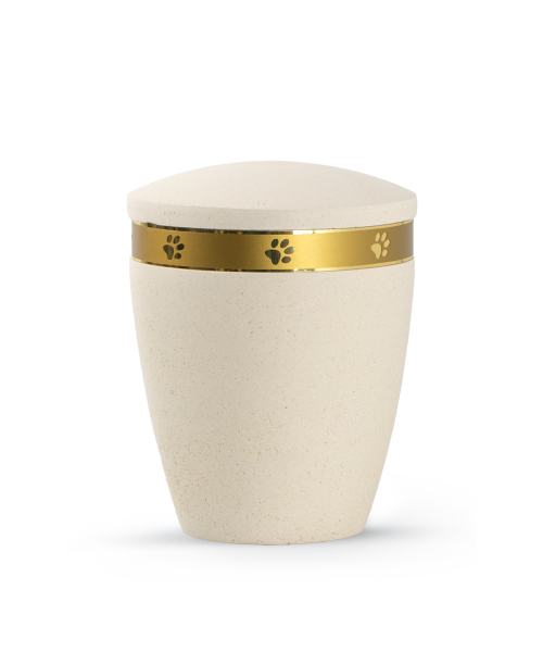 Elegant pet urn in a bright cream stone look with a golden paw band décor, suitable for home display or ground burial.